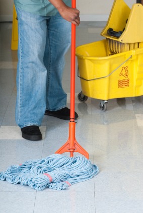 World Class Cleaning Services janitor mopping floor